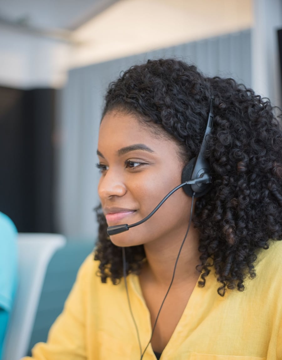 A SeamlessVoIP agent handling a call with a headset